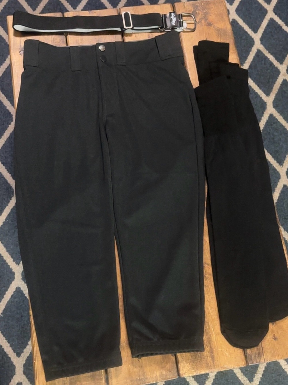 Women’s size medium softball pants, 3 pairs of socks and belt.